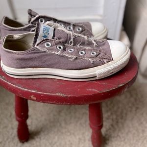 Distressed, women’s slip on Converse in chocolate brown size 5.5.